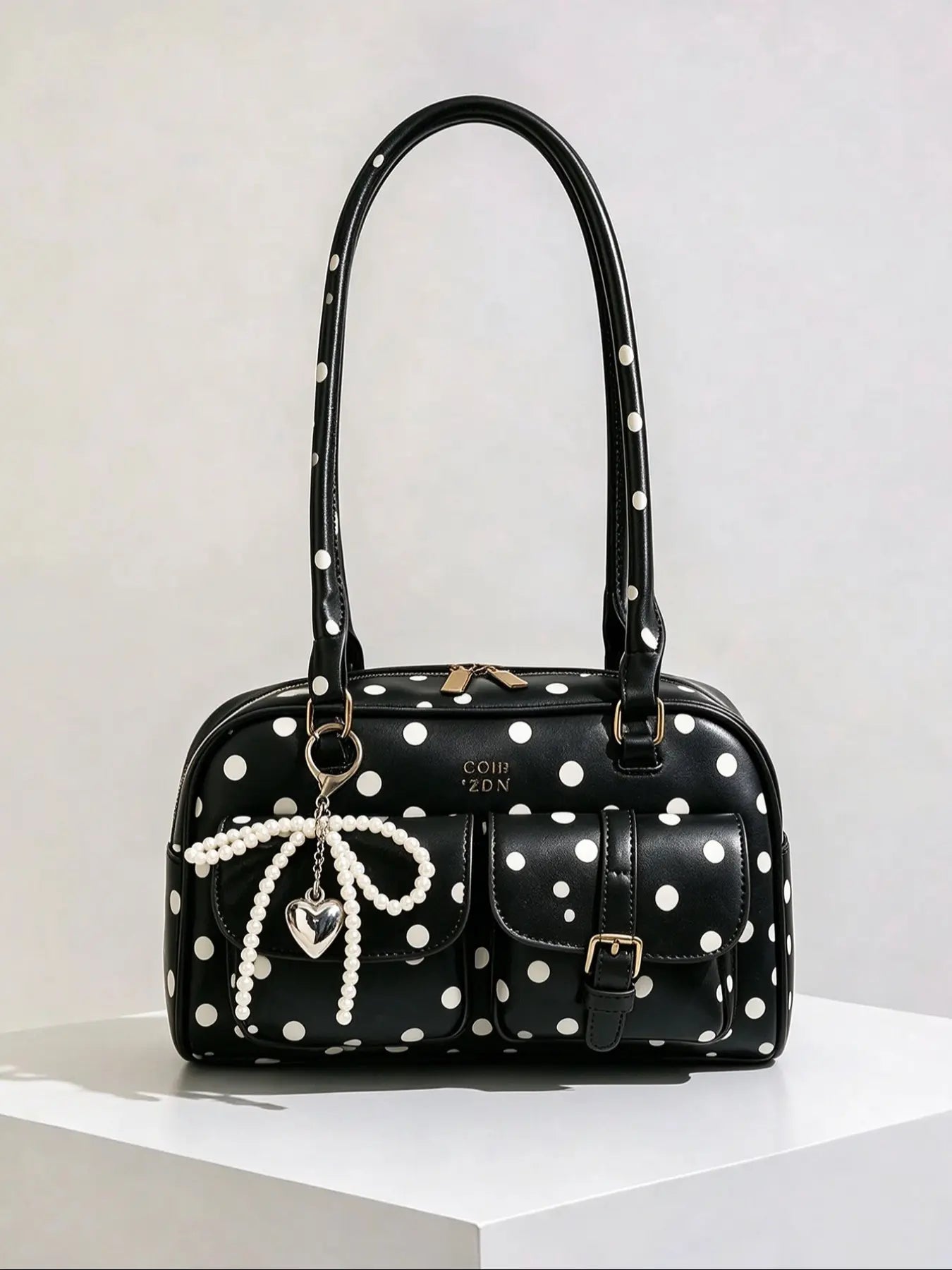 Retro style double pocket handbag, fashionable underarm shoulder bag with pendant, simple and versatile single shoulder baguette bag, niche design suitable for college students, office workers daily commuting, etc.