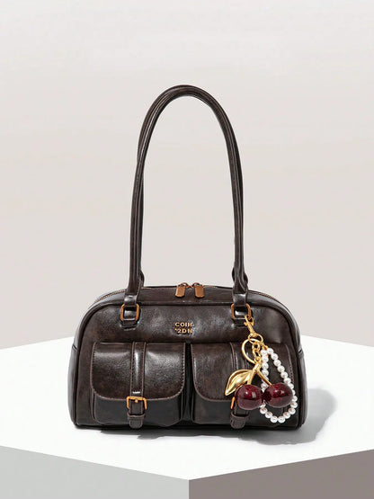 Retro style double pocket handbag, fashionable underarm shoulder bag with pendant, simple and versatile single shoulder baguette bag, niche design suitable for college students, office workers daily commuting, etc.