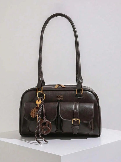 Retro style double pocket handbag, fashionable underarm shoulder bag with pendant, simple and versatile single shoulder baguette bag, niche design suitable for college students, office workers daily commuting, etc.